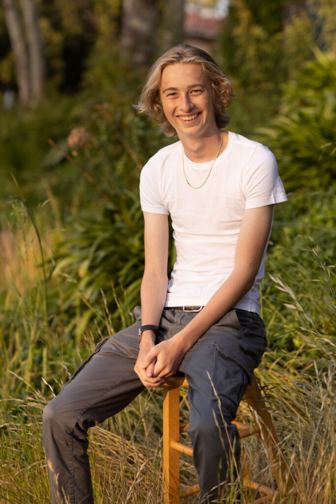 Fun senior session making high school senior laugh during the session