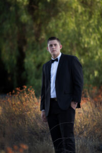 Senior athlete posing for for his senior session.